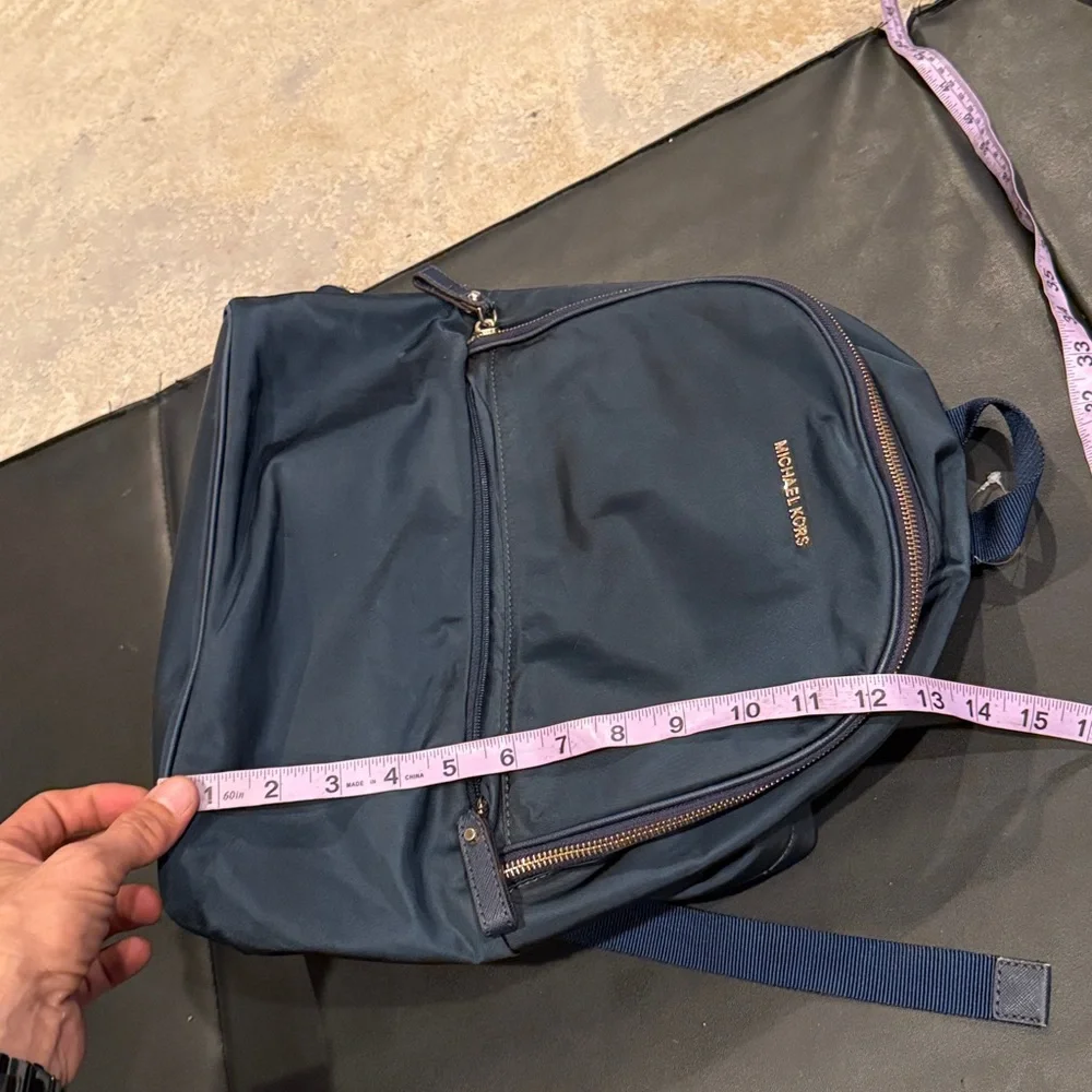 MICHAEL MICHAEL KORS navy Backpack with gold hardware GUC